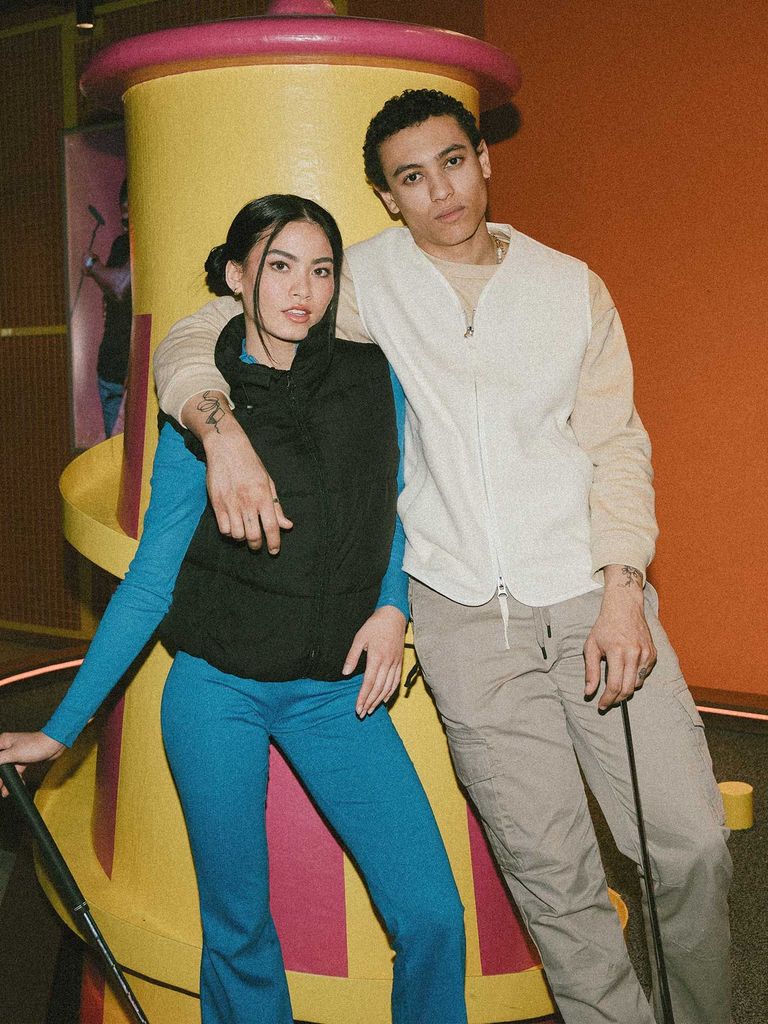 2 students at a Putt and Play mini golf course